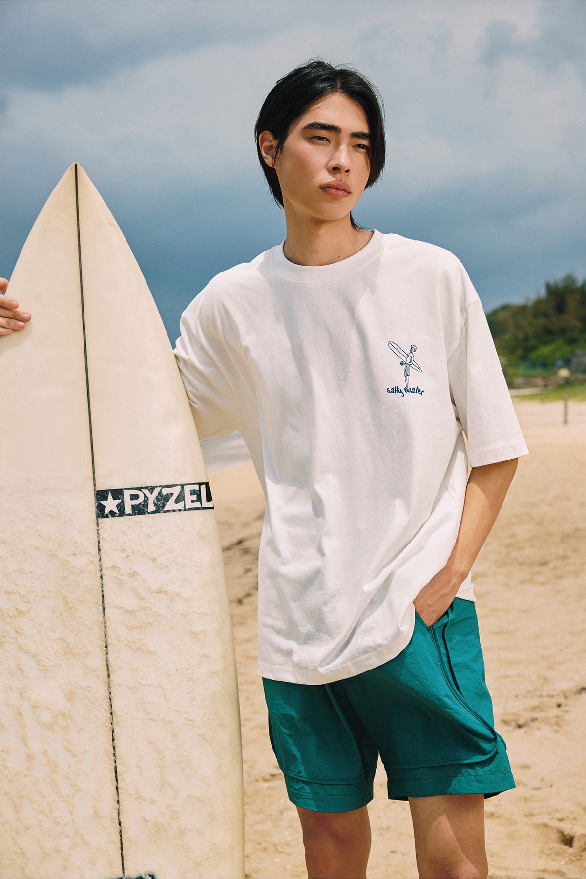 Embroidered cotton and a utility short, straight off the water.