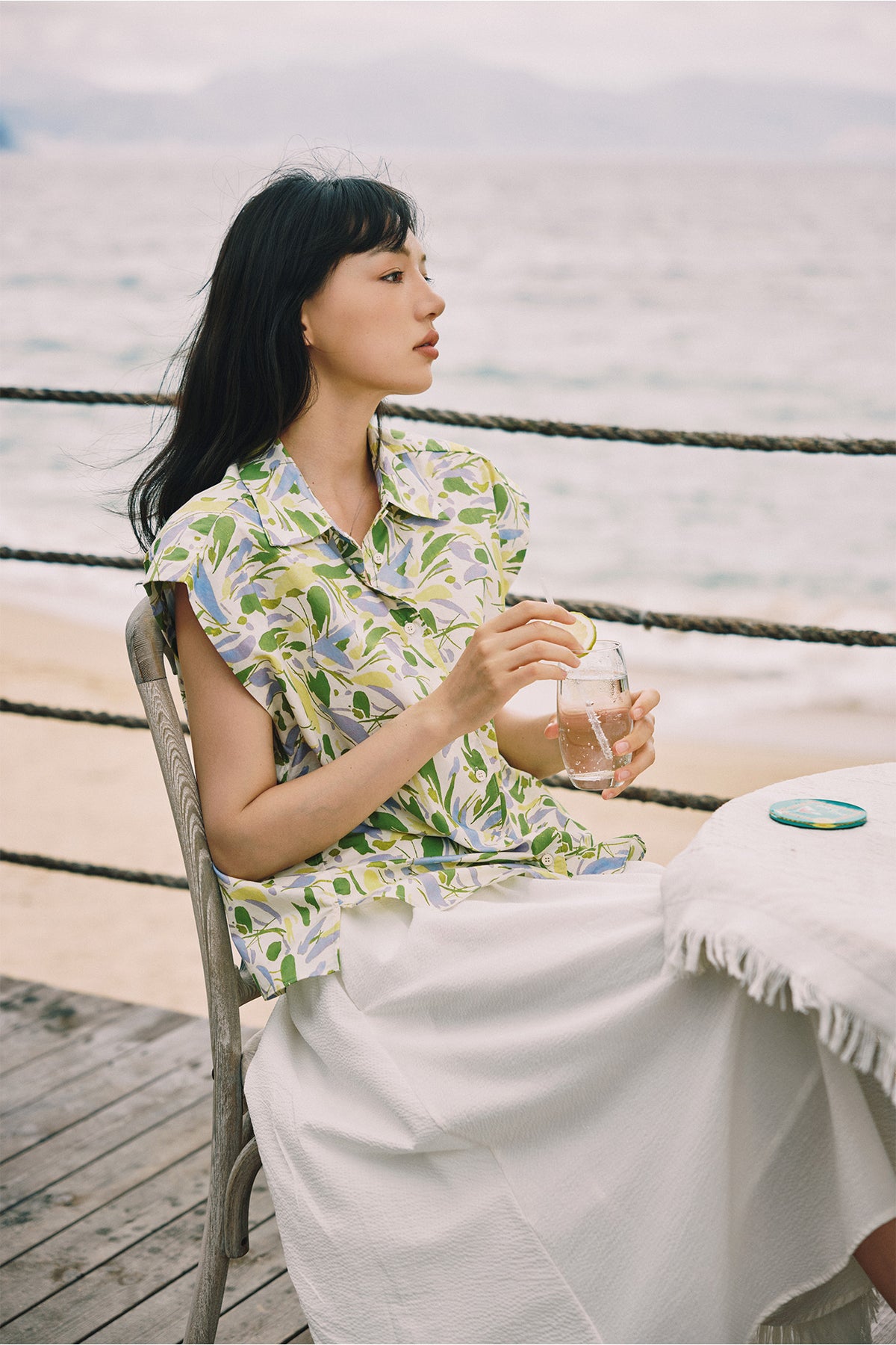 Printed shirting, softened with a tiered cotton skirt.